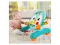 Un bébé joue avec le trotteur d'activités FISHER-PRICE.