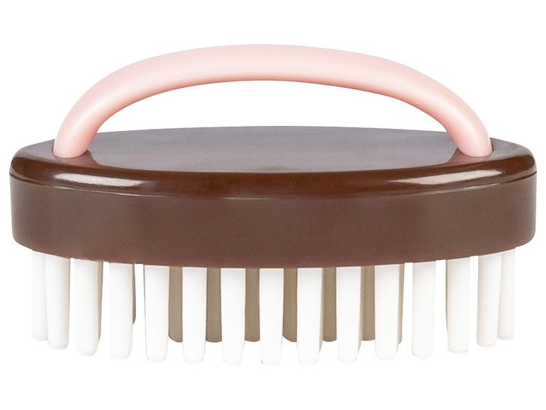 Une brosse brune avec une poignée rose