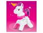 Licorne jouet à construire Mega Bloks avec roues sur fond rose.