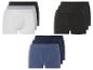 Trois packs de boxers en noir, gris et bleu.