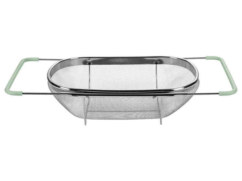 Une passoire en acier avec des poignées vertes.