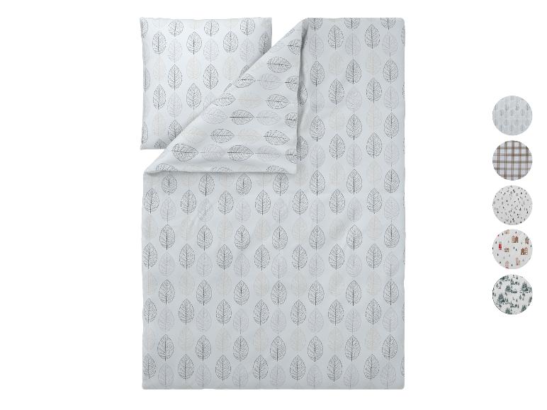 Parure de lit avec motif de feuilles et options de design supplémentaires.
