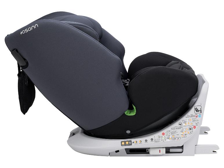 Siège auto enfant gris foncé et noir avec base gris clair, avec étiquettes de sécurité.