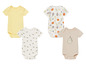 Quatre bodies pour bébés, dont un avec un motif d'abeilles et un avec un motif de fruits.