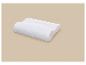 Oreiller orthopédique blanc avec housse matelassée sur fond beige