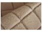 Gros plan sur un tissu doux et pelucheux beige.