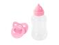 Sucette et biberon roses pour bébé.