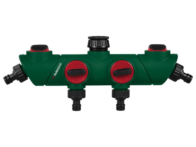 Distributeur d'eau vert Parkside à quatre sorties et deux vannes rouges.