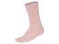 Une chaussette rose pâle, style uni.