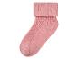 Une chaussette rose avec un bord côtelé.