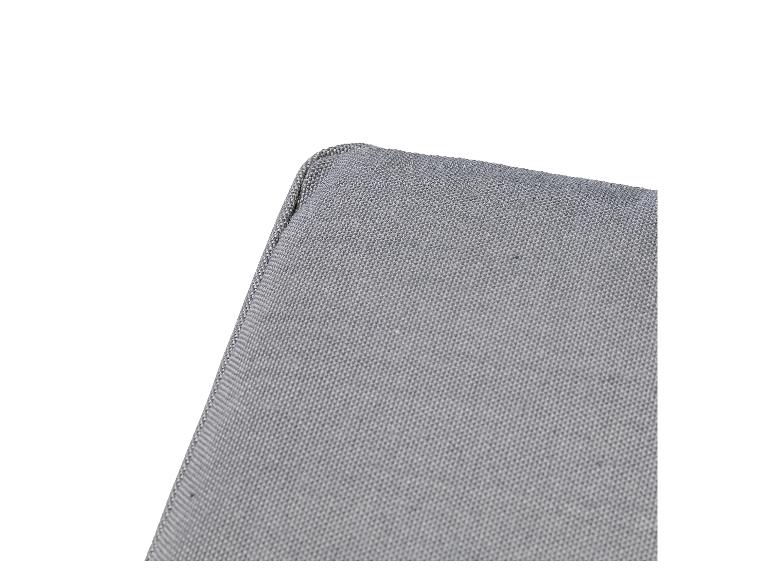 Coin de coussin ou matelas gris avec texture de tissu