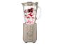 Un blender beige SilverCrest avec un pichet en verre rempli de yaourt et de baies.