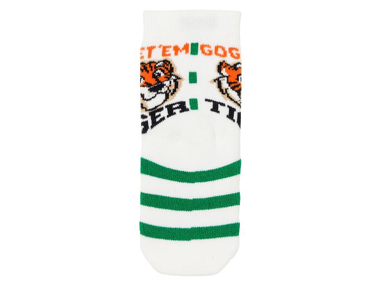 Des chaussettes blanches avec des rayures vertes et un motif de tigre.