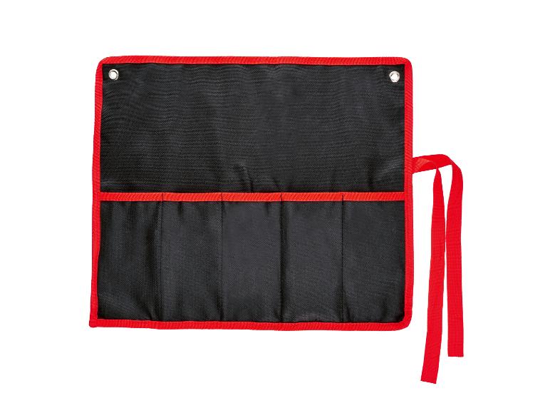 Trousse à outils noire enroulable avec bords et sangles rouges, ouverte et vide.
