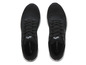 Chaussures de running noires Crivit avec semelle blanche.