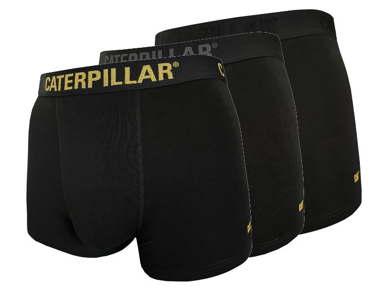 Trois boxers noirs pour hommes avec lettrage jaune sur la ceinture.