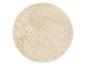 Tapis rond crème à poils longs avec une texture douce et moelleuse.