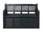 Un banc de jardin en bois noir avec un espace de rangement.