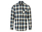 Une chemise à carreaux à manches longues en marron, bleu et blanc.