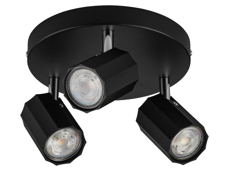 Plafonnier noir à trois spots LED orientables.