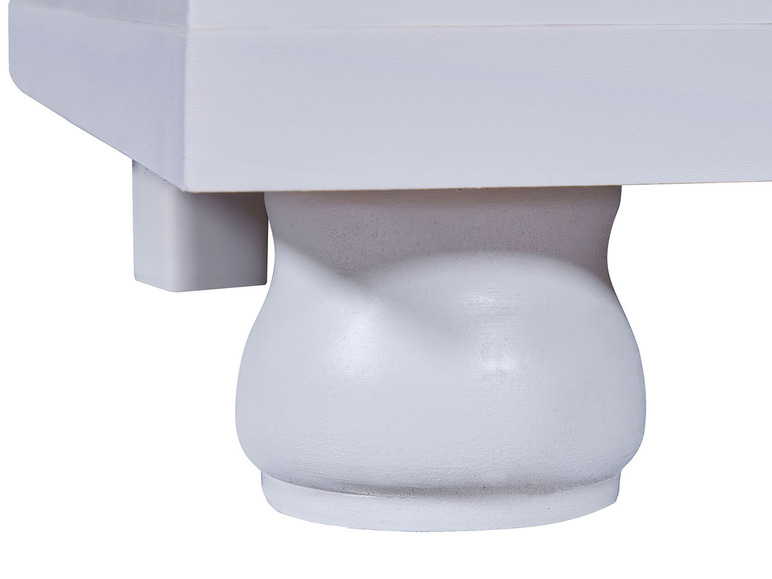 Pied de table en bois blanc avec des coins arrondis.