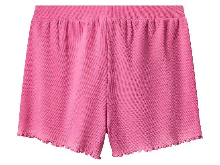 Shorts rose en côtes, détail festonné.