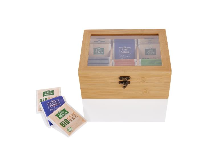 Une boîte à thé en bois avec des sachets de thé Lord Nelson