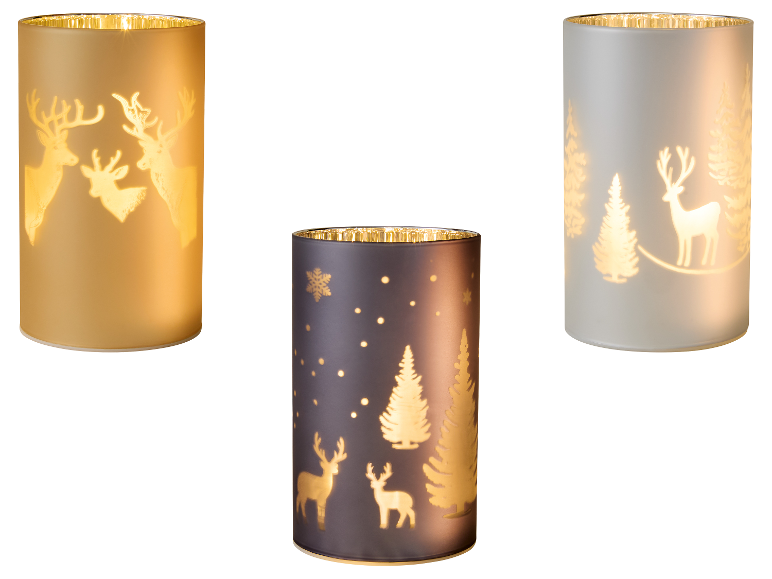 Trois lanternes LED LIVARNO® avec motifs de Noël : cerfs et sapins.