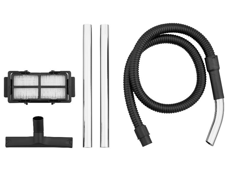 Accessoires d'aspirateur : filtre, tubes, tuyau et buse de sol.