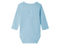 Un body bébé bleu clair à manches longues.