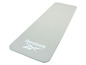 Un tapis de yoga gris Reebok avec une surface texturée.
