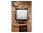 Grille-sandwich SilverCrest sur une table en bois avec du pain et des tomates.