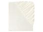 Un drap housse en coton blanc avec élastique.