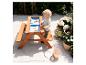 Table de pique-nique sable et eau SUNNY Dave avec un enfant qui joue.