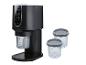 Machine noire à glaces et boissons avec récipients doseurs pour divers desserts froids.