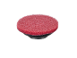 Éponge de nettoyage rouge avec une base noire.