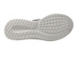 La semelle d'une sneaker blanche avec un motif de bande de roulement grossier.