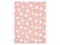 Couverture rose avec un motif de fleurs et de feuilles blanches.