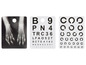 Une radiographie de mains, un test de vue avec des lettres et un test de vue avec des anneaux.