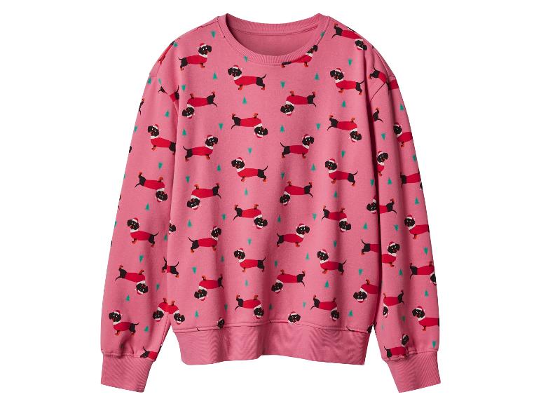 Un sweat-shirt rose avec un imprimé de chiens teckels de Noël et de sapins de Noël.