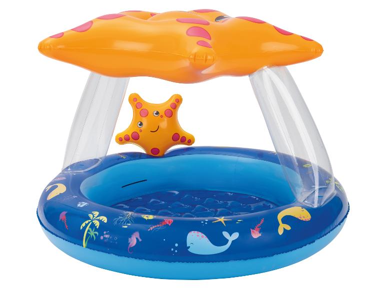 Piscine gonflable pour enfants avec auvent orange et décorations marines.