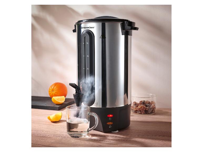 Distributeur de boissons chaudes SilverCrest avec vapeur, oranges et sucre candi.