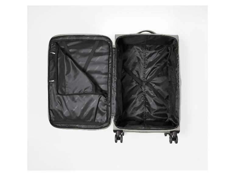 Valise de voyage ouverte avec intérieur noir et sangles de fixation.