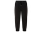 Pantalon de survêtement noir avec ceinture élastique.