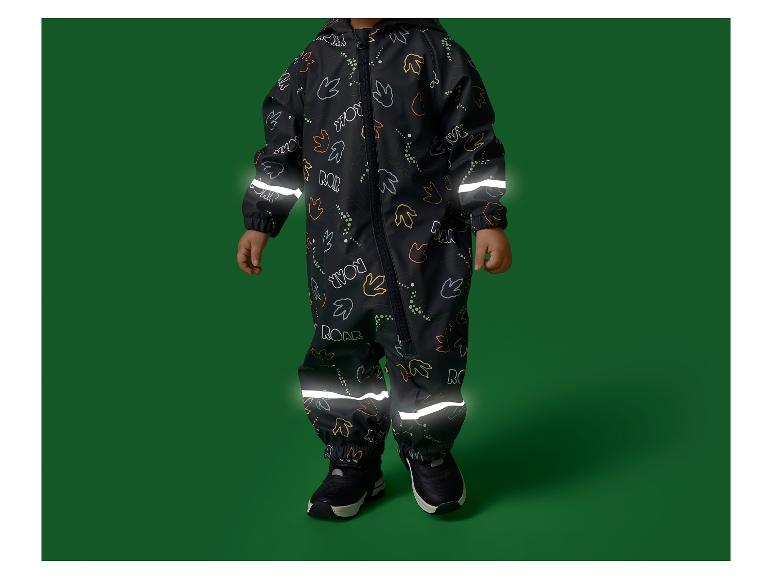 Combinaison de pluie noire pour enfants avec éléments réfléchissants et motif dinosaure.