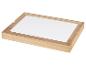 Boîte en bois avec insert blanc.