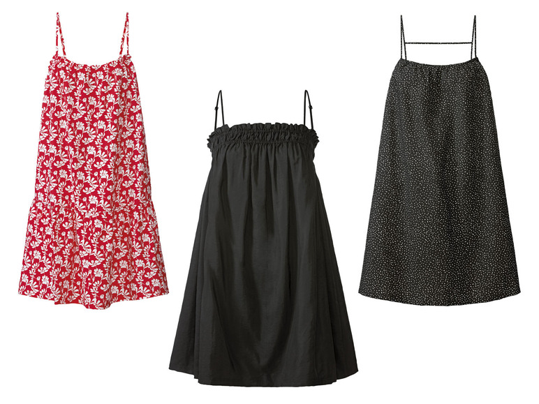 Trois robes d'été : une rouge à fleurs, une noire et une à pois blancs.