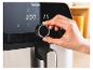 Une friteuse à air Tefal avec minuterie digitale et contrôle de la température.
