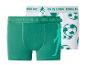 Deux paires de boxers pour hommes, un vert et un blanc avec des ballons de football.