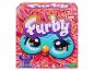 Boîte du jouet interactif Furby avec fourrure colorée et grands yeux.